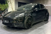 Tesla Model Y  Model y performance dual motor awd pano 21?